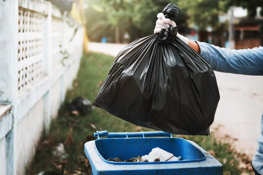 Is It Illegal to Put Trash in Someone Else's Trash Can